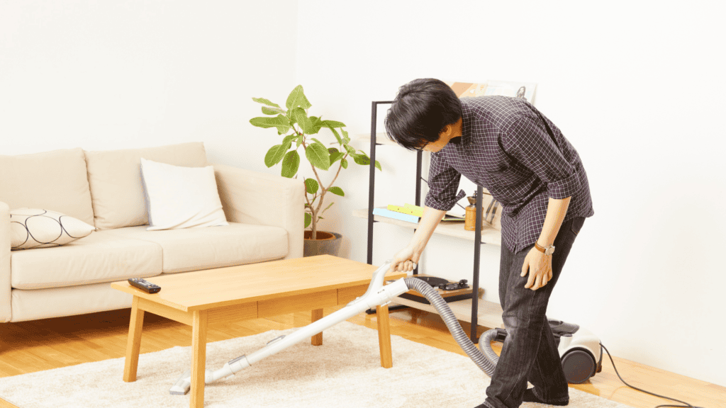 vacuuming cleaning and low back pain